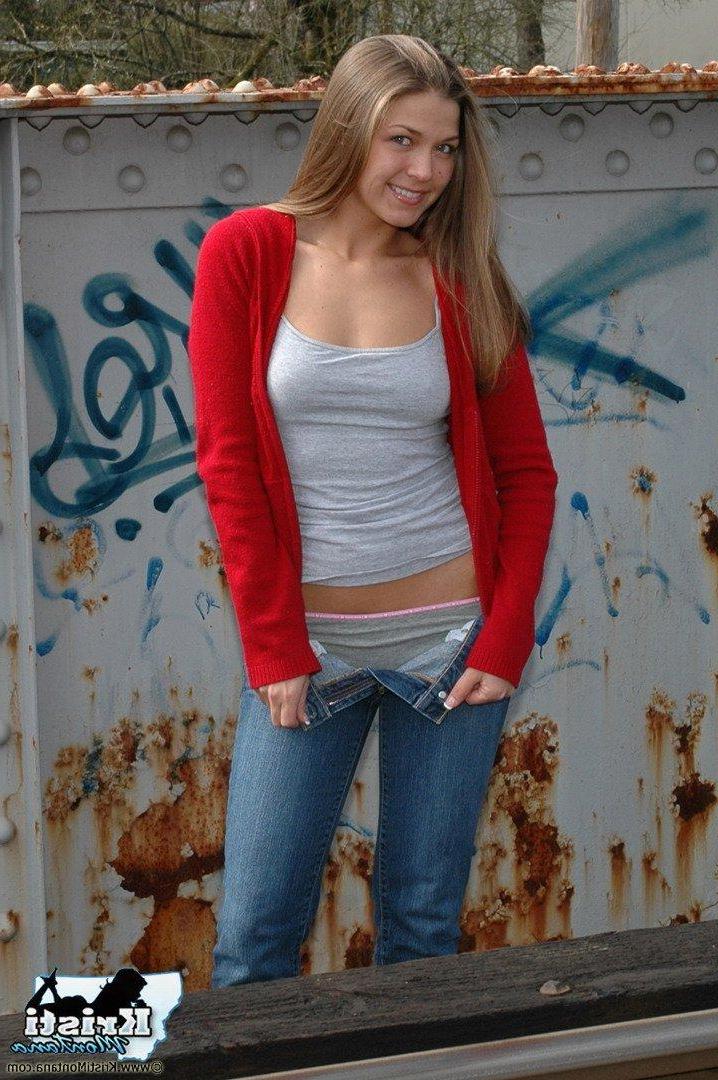 15P Pictures of teen star Kristi Montana exposing her tits on the train tracks