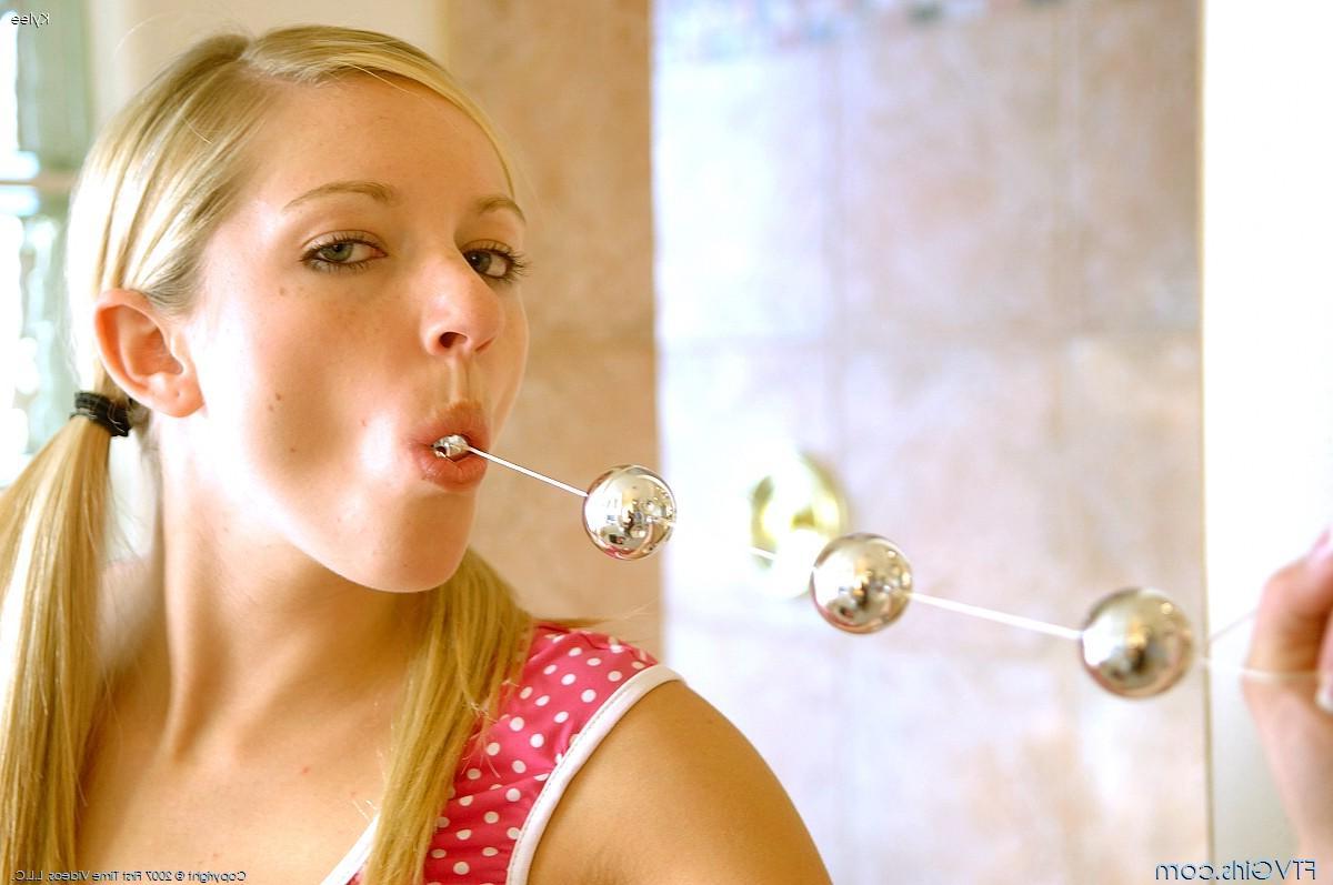 20P Pictures of a cute blonde playing with her pussy