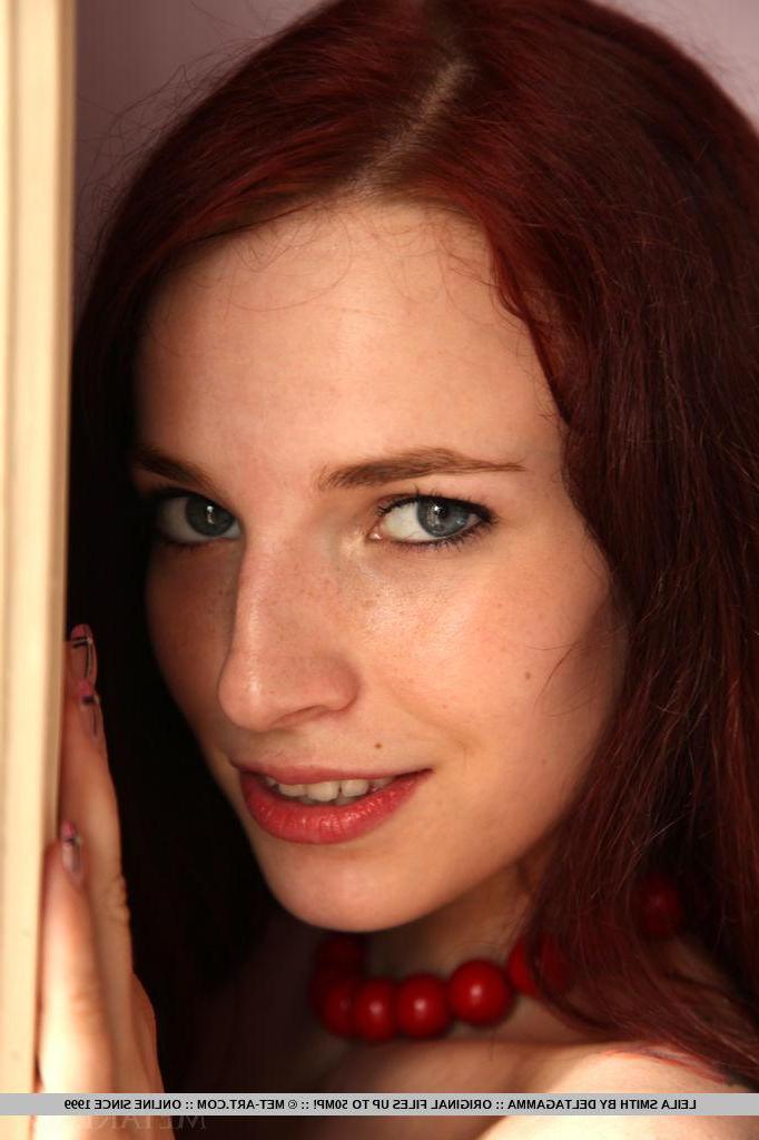 18P Redhead hottie Leila Smith shows you her tight nude body