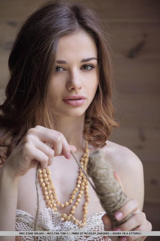 18P Beautiful brunette girl Loretta A strips completely naked and shows you her tight pussy