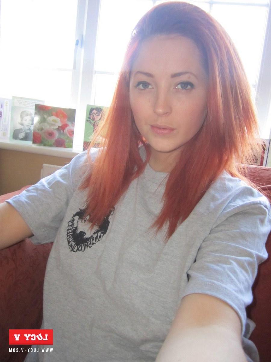 9P Redhead model Lucy V strips from her cute little shorts at home