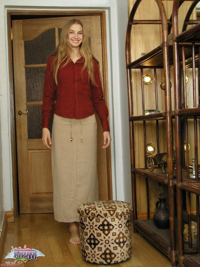 15P Pictures of Masha Star teasing in red lingerie