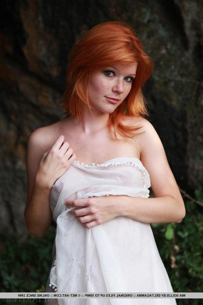 18P Stunning redhead Mia Sollis flaunts her perfect body and puffy nipples outside