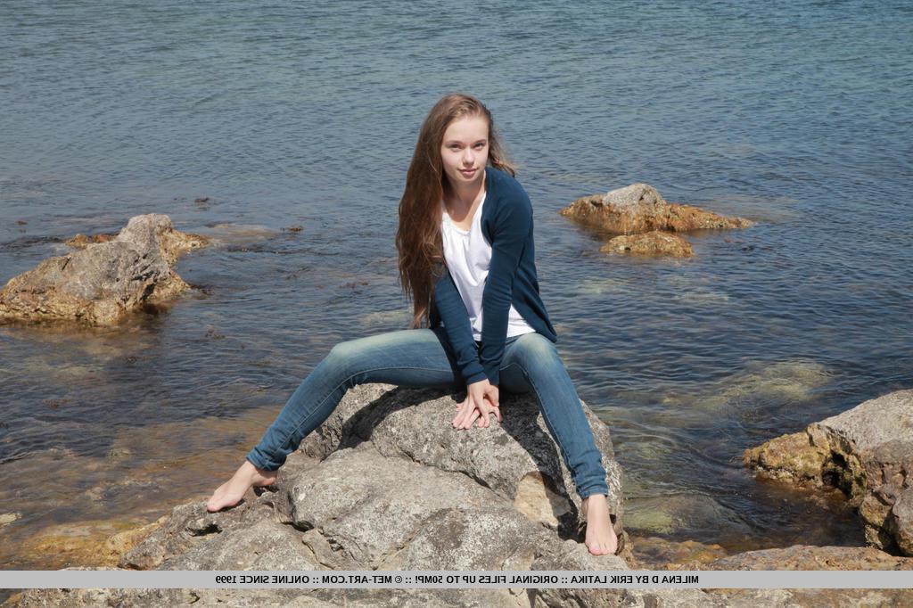 18P Blonde teen Milena D shows off her tight body in the water