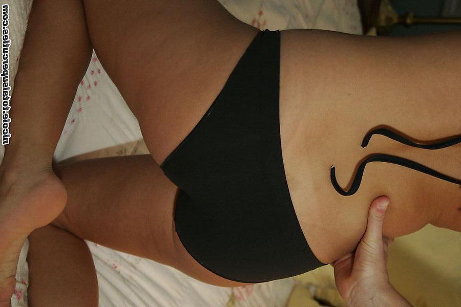 18P Pictures of a cute teen model teasing in bed