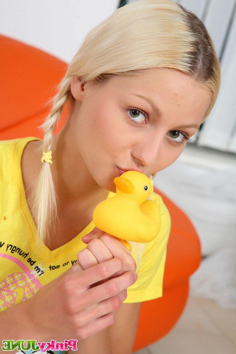 15P Pictures of teen chick Pinky June getting kinky with a ducky