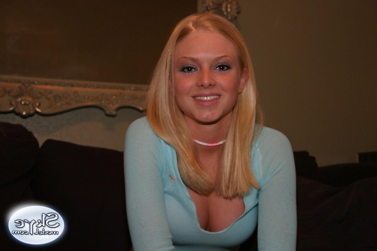 12P Cute teen Skye Model shows off her perky tits in a very low cut top