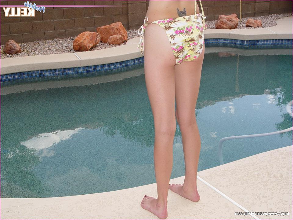20P Pictures of teen porn girl Poolside Kelly all naked by the pool