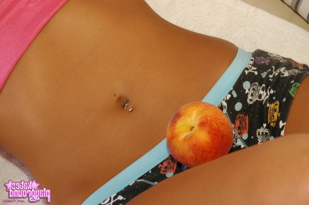 12P Rio teases with her tight round ass and a couple of juicy peaches