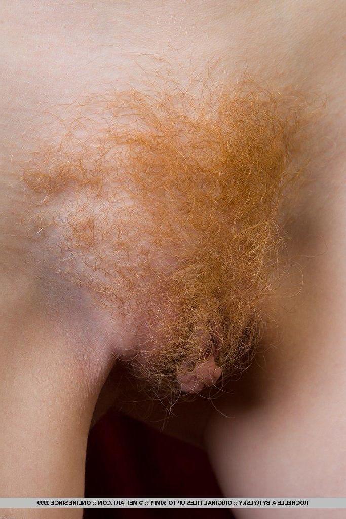 18P Pictures of redhead teen Rochelle A showing her red pussy