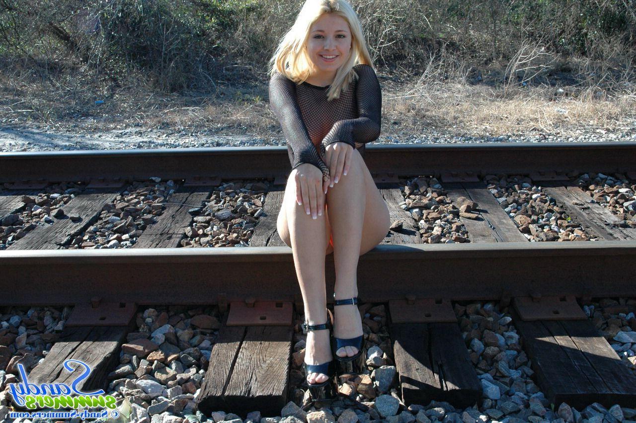 20P Pictures of Sandy Summers exposing herself on a train track