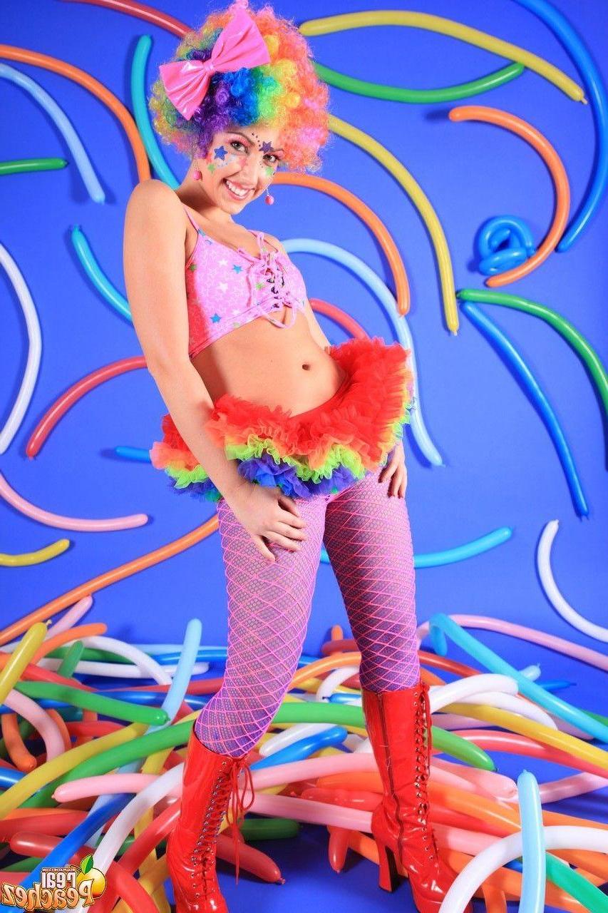 15P Pictures of teen hottie Real Peachez dressed as a slutty harlequin