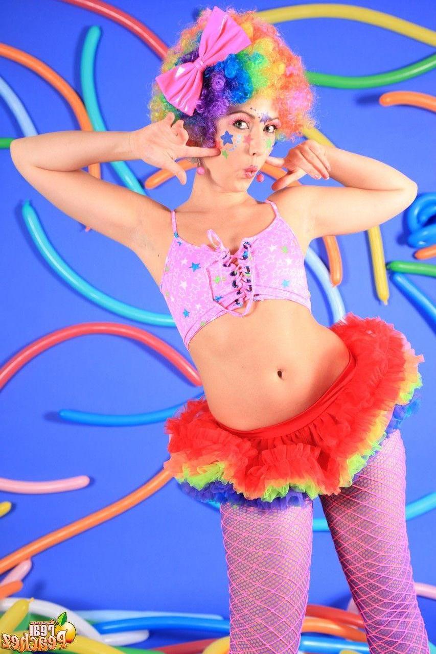 15P Pictures of teen hottie Real Peachez dressed as a slutty harlequin
