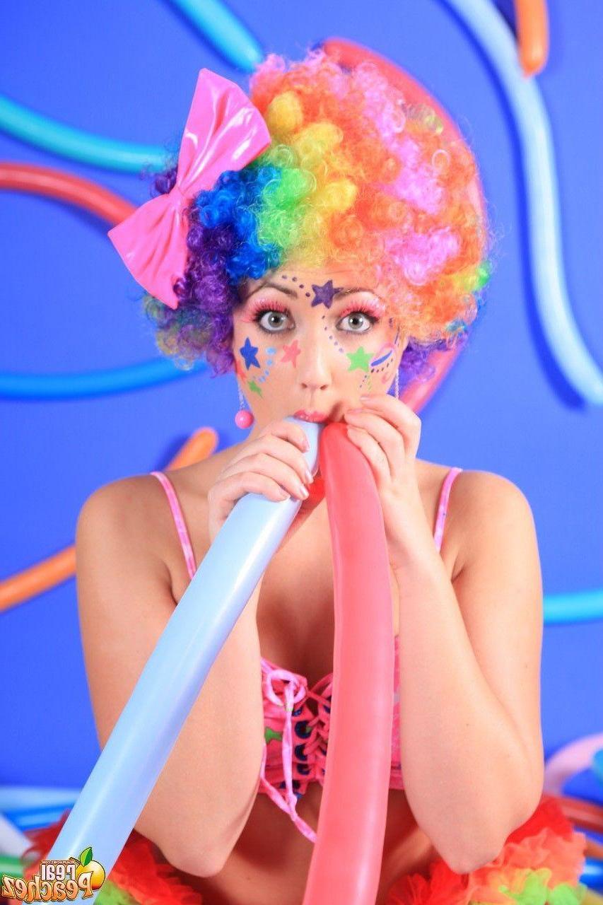 15P Pictures of teen hottie Real Peachez dressed as a slutty harlequin