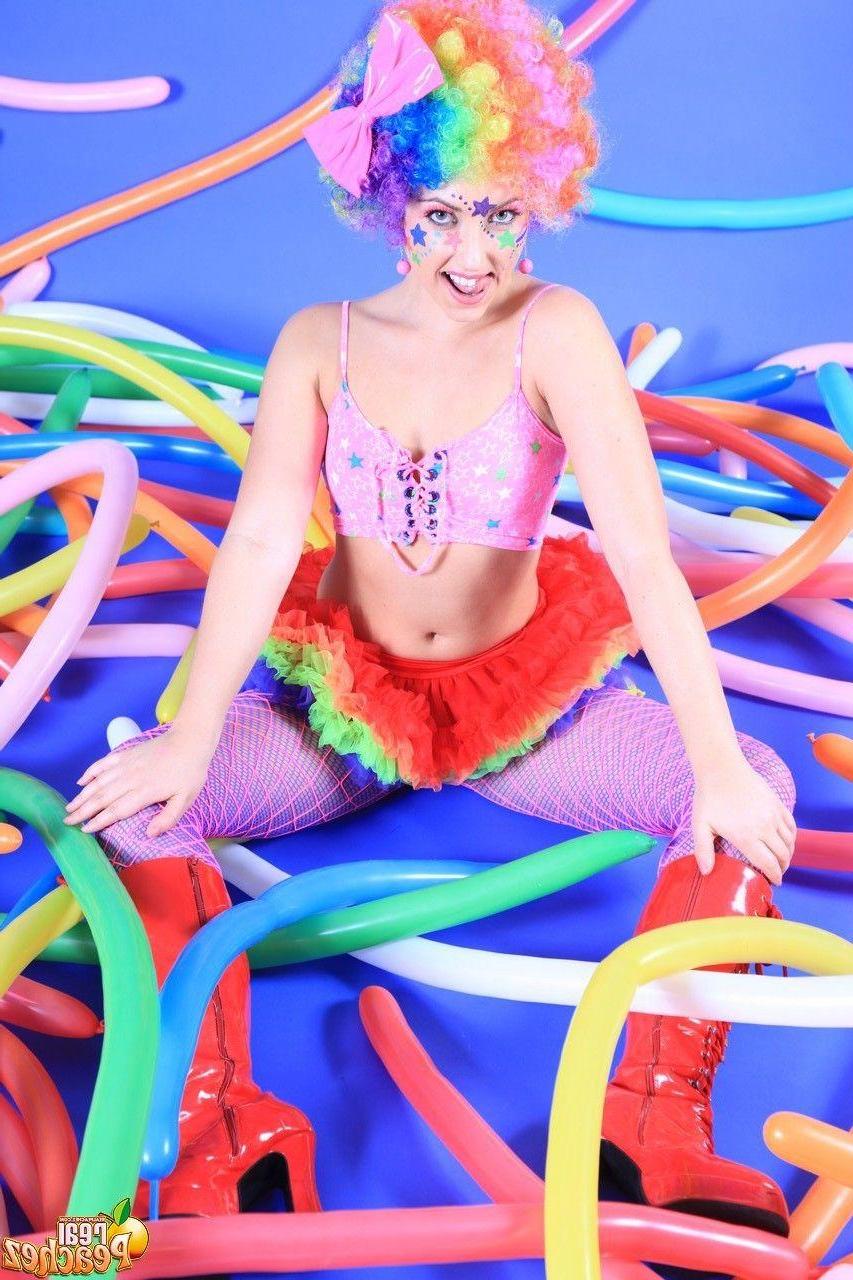 15P Pictures of teen hottie Real Peachez dressed as a slutty harlequin