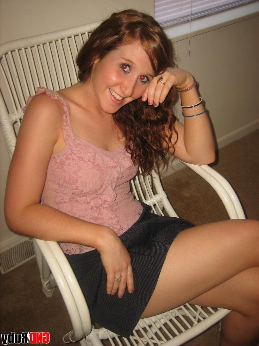 12P Redhead teen Ruby strips naked on the wicker chair to rub her sweet teenage pussy