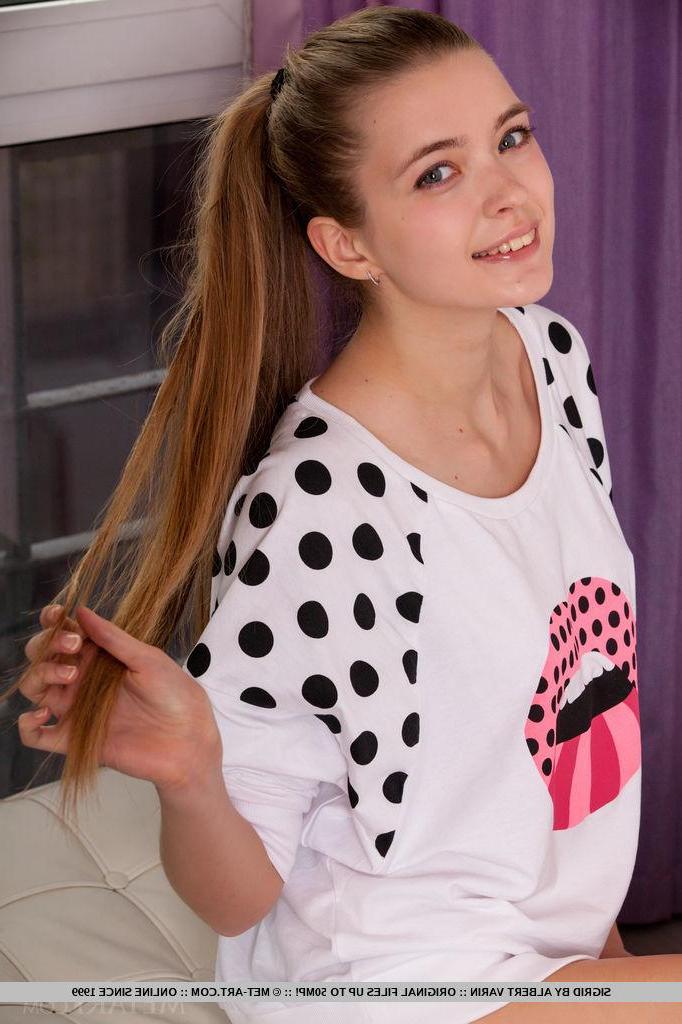 18P Pretty teen girl Sigrid strips nude and shows you her beautiful pussy