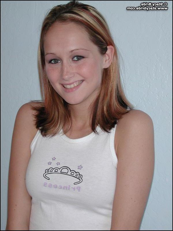 20P Pictures of a cute coed getting nude at home