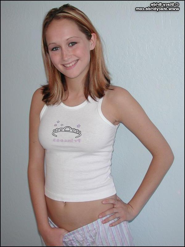 20P Pictures of a cute coed getting nude at home