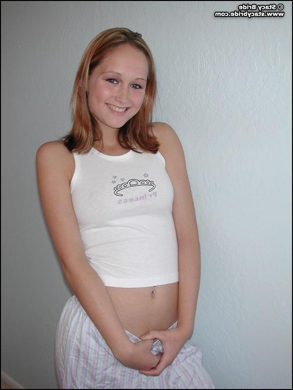 20P Pictures of a cute coed getting nude at home