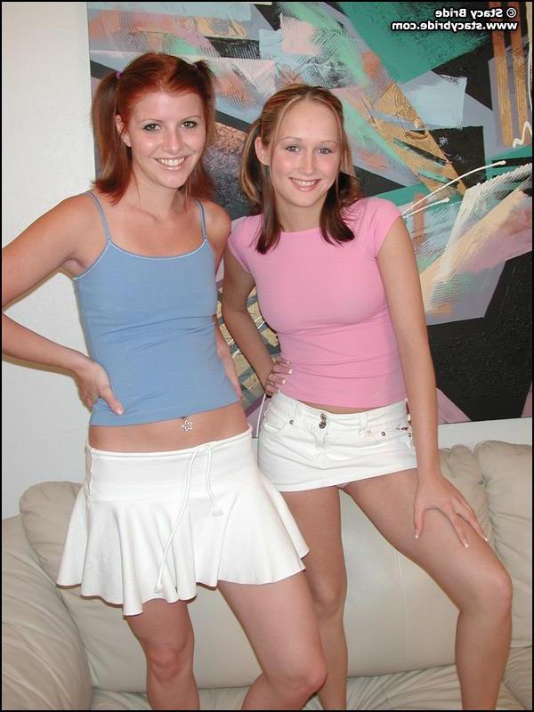 20P Pictures of two teen coeds getting naked together
