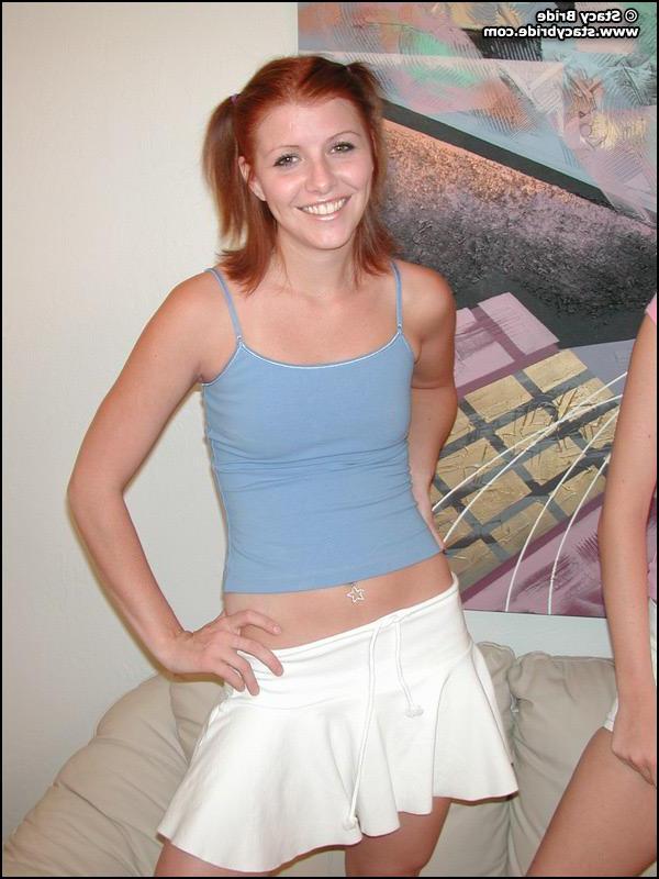 20P Pictures of two teen coeds getting naked together