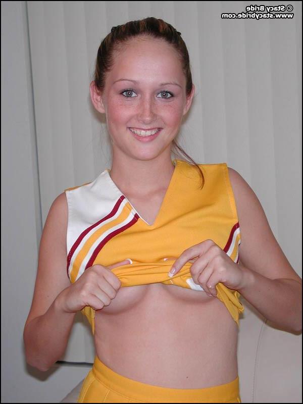 20P Pictures of a cheerleader getting naked at home