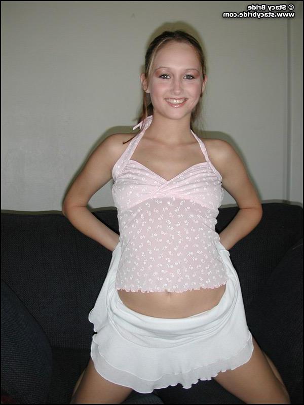 20P Pictures of Stacy Bride getting naked on a couch