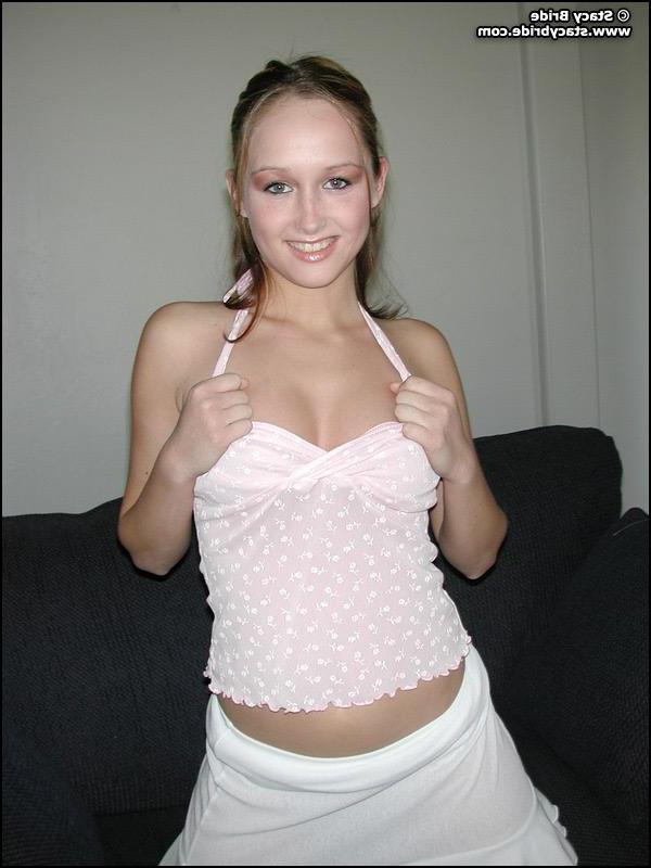 20P Pictures of Stacy Bride getting naked on a couch