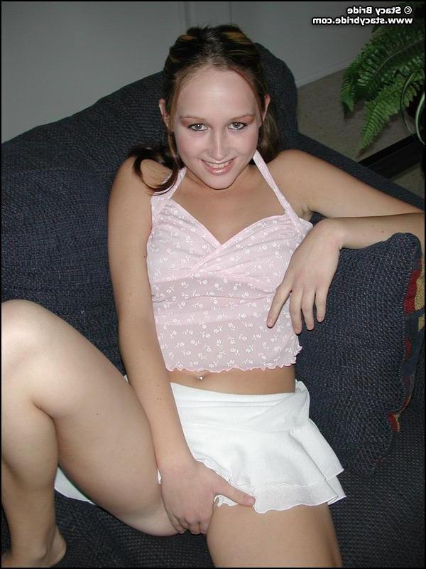 20P Pictures of Stacy Bride getting naked on a couch