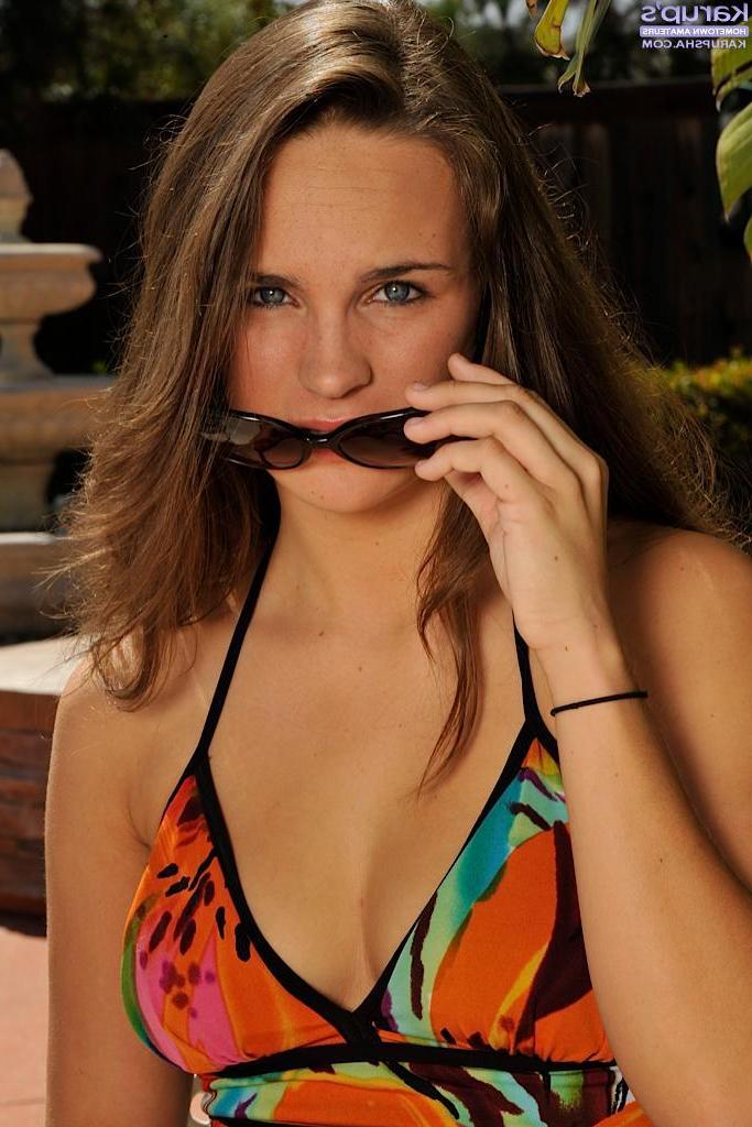 15P Brunette goddess Teal Conrad strips naked under the hot sun