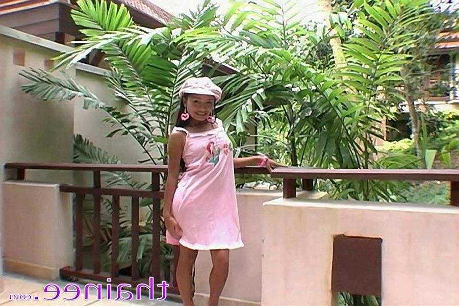 16P Pictures of teen porn girl Thainee rubbing her wet pussy