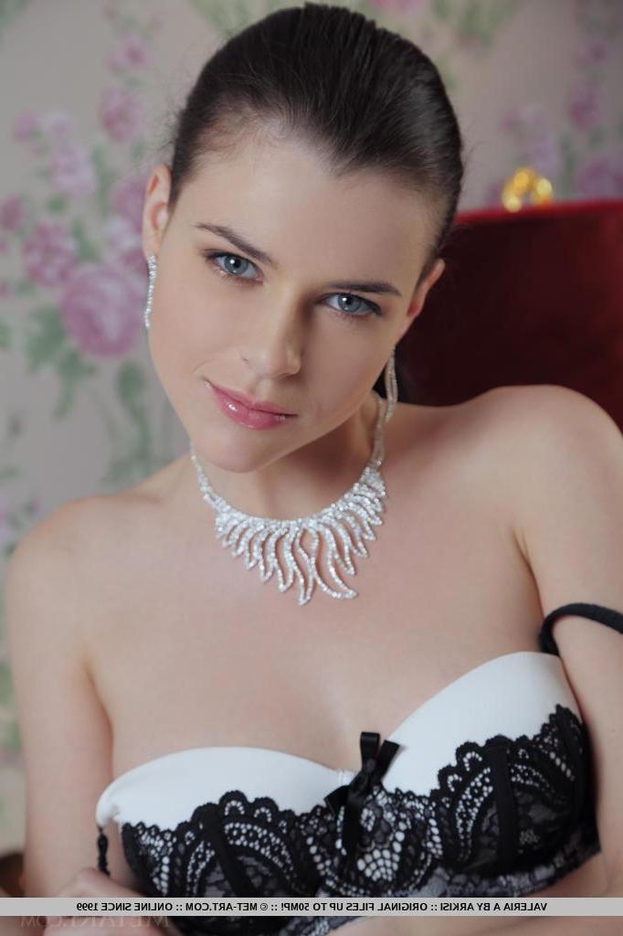 18P Brunette hottie Valeria A strips down to her black heels just for you