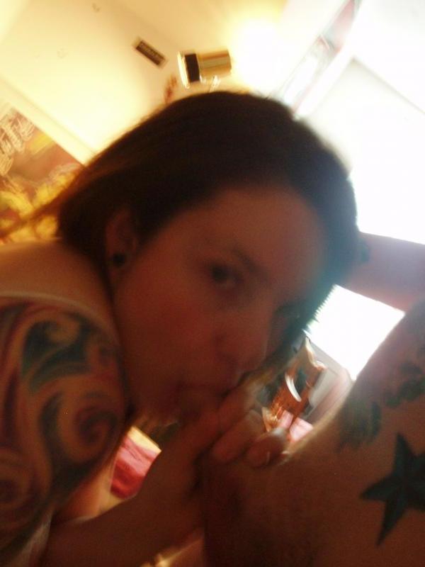16P Tattooed hottie sprayed with jizz while sucking on a cock