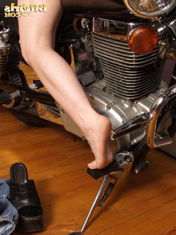 15P Cute teen shows off her pretty feet on a motorcycle