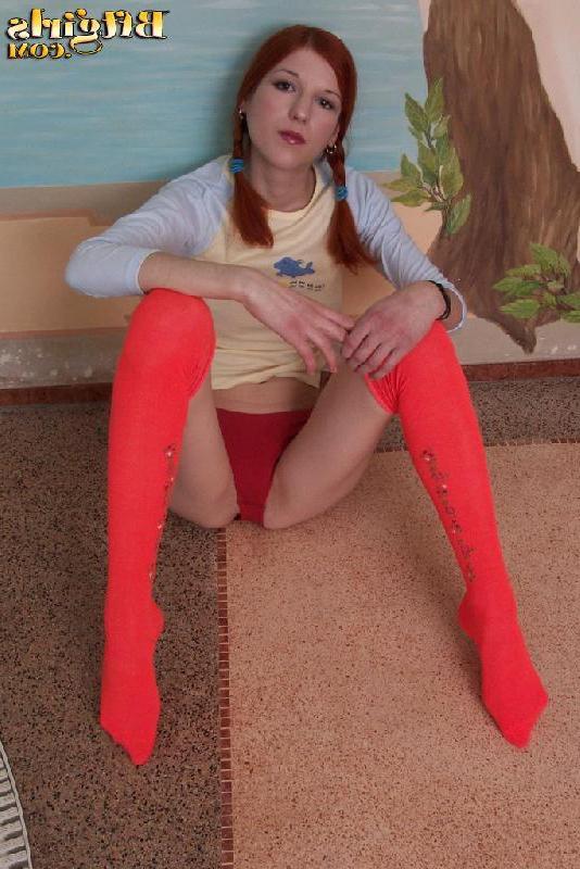 15P Hot redhead teen in pigatils strips naked and shows her pretty feet