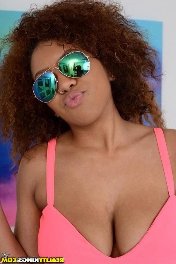 20P Busty ebony girl Katt uses her big boobies to pleasure a hard cock