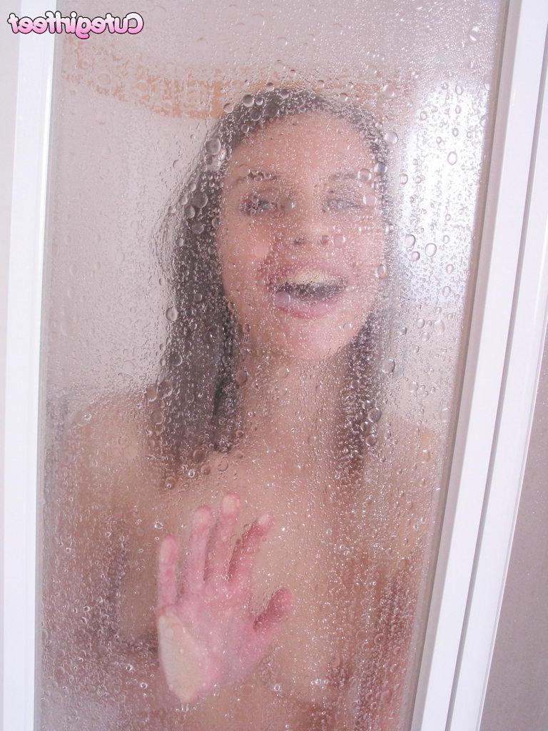15P Hot brunette teen washes her pretty feet in the shower
