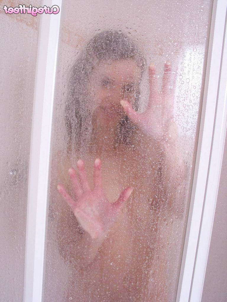 15P Hot brunette teen washes her pretty feet in the shower