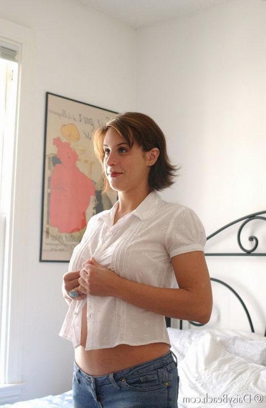 15P Brunette teen Leah exposes her round boobies in bed