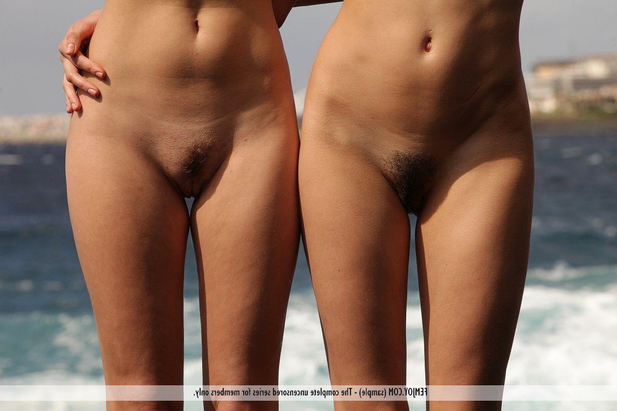 16P Pictures of two lovely teen girls naked on a beach
