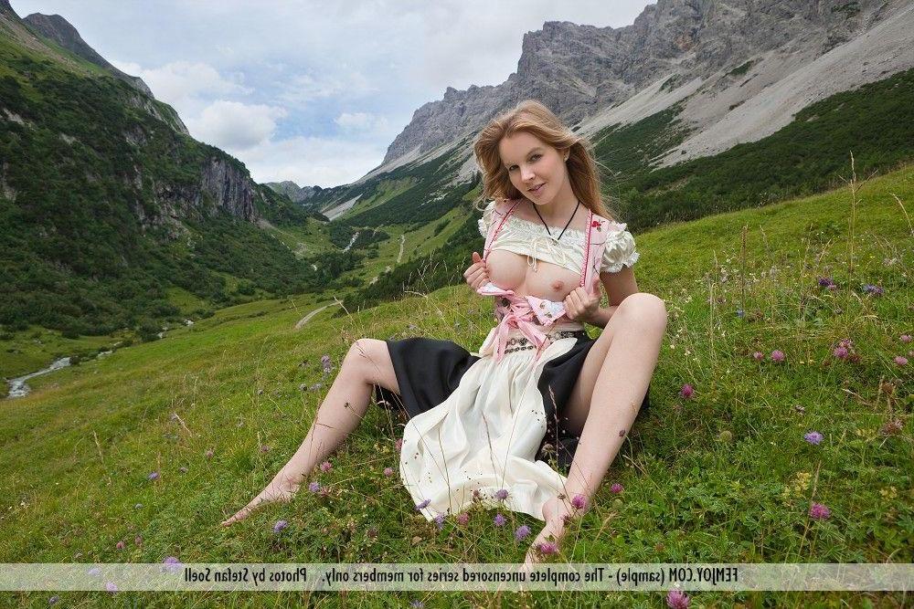 12P Pictures of a hot blonde teen enjoying the outdoors