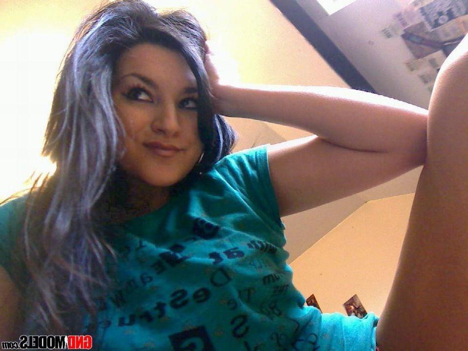 12P Pictures of a cute brunette girl teasing in socks