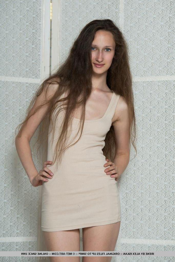 18P Brunette model Irene strips nude and shows you her hairy pussy