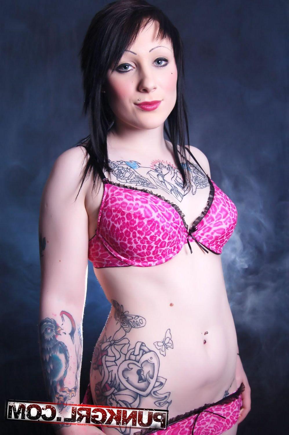 20P Pictures of a hot teen punk Peach wearing only her tattoos