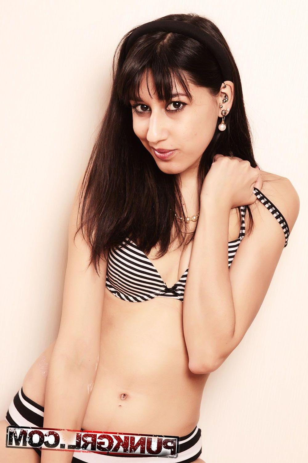 20P Pictures of teen punk Rach stripping to her socks