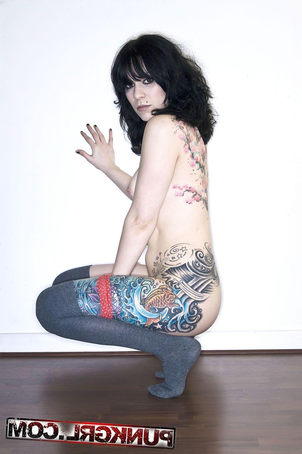 20P Pictures of teen punk Aiyla stripping to her thigh-high socks