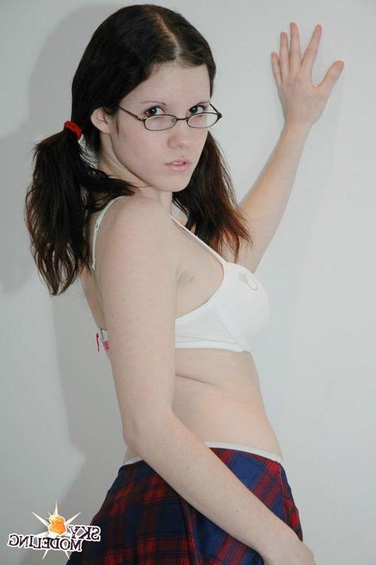 15P Pictures of a schoolgirl in glasses