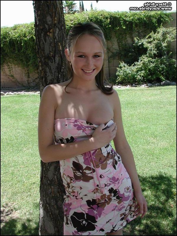 20P Pictures of Stacy Bride getting naked outside