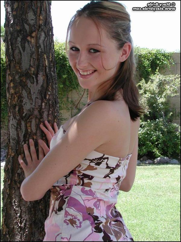 20P Pictures of Stacy Bride getting naked outside
